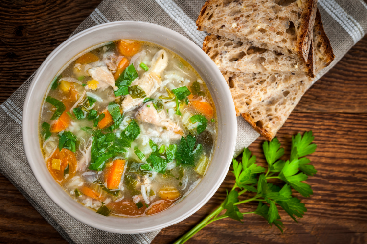 chicken soup with side of toasted bread