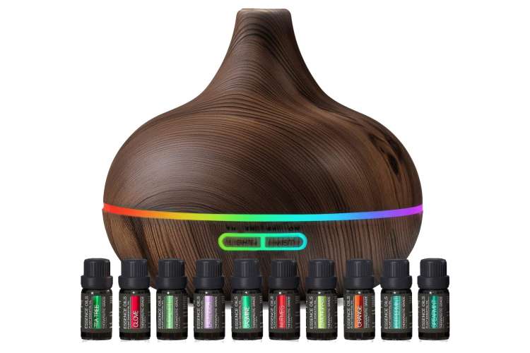 aromatherapy diffuser with vials of essential oils