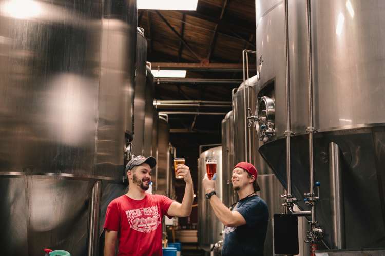 go on brewery tours for fun team building activities in austin