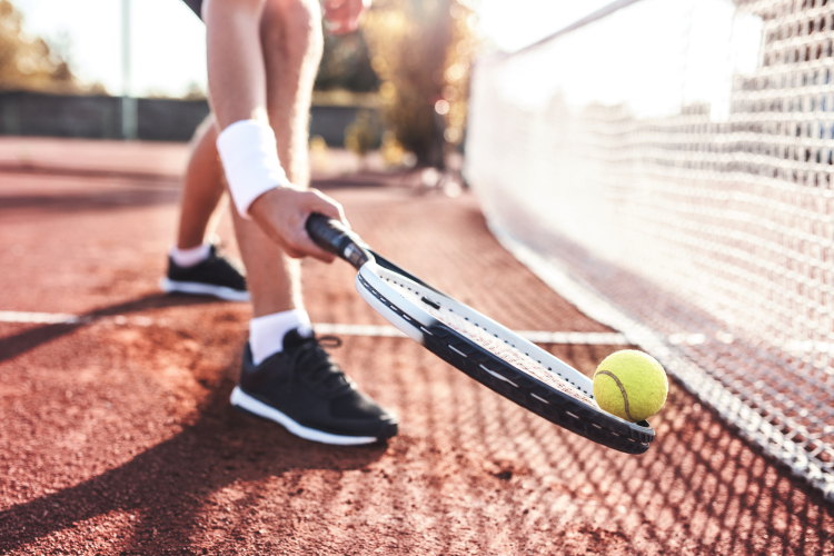 playing tennis on a court