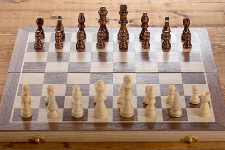 a chess set is set up ready to play