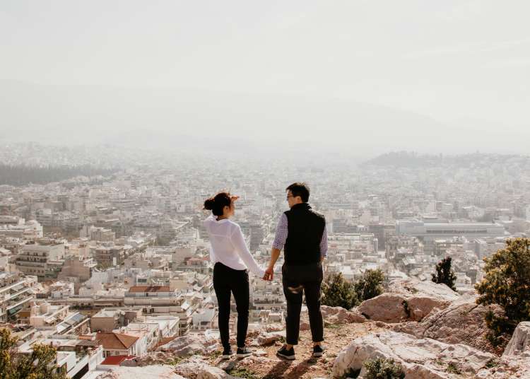 couple celebrating their first anniversary while traveling to a cherished locale