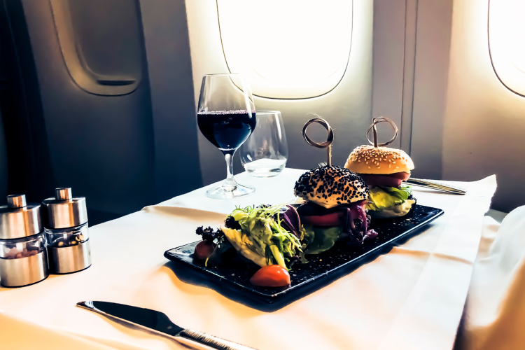 add flying first class to your foodie bucket list