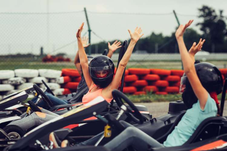 friends go karting on a race track