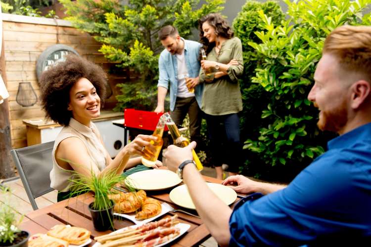 friends enjoying a double date barbecue