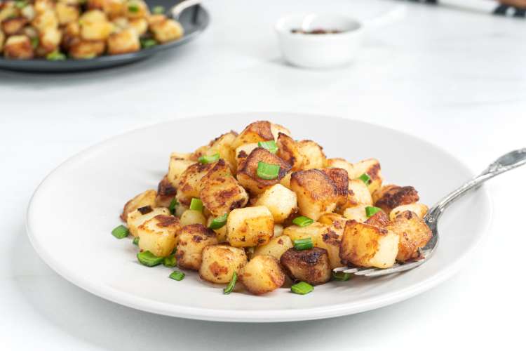 crispy and fluffy skillet breakfast potatoes are a versatile christmas breakfast idea