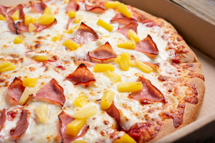 a famous pizza style is hawaiian pizza