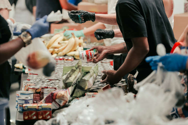 coworkers volunteering at a food bank in nyc