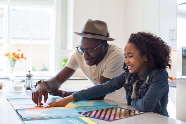 father and daughter planning a weekend getaway