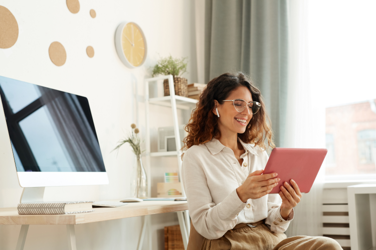 woman holding virtual meeting on ipad