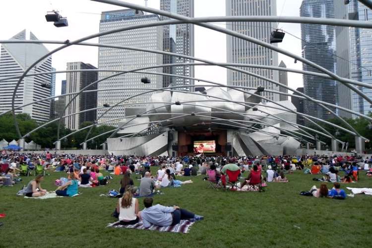 the millennium park summer film festival is a fun date idea in chicago