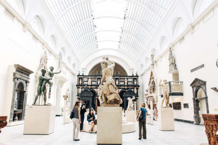 people exploring a museum