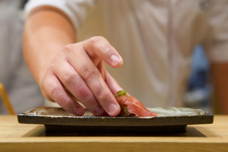 sushi chef preparing omakase