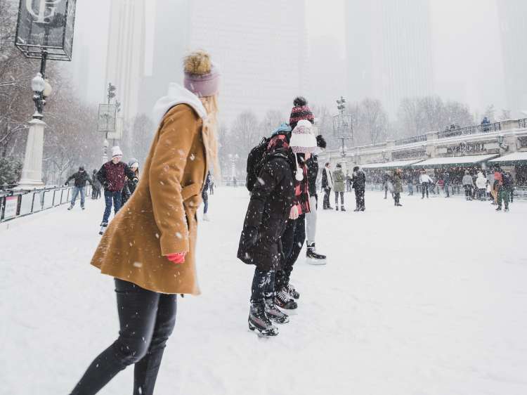 Ice Skating is a fun holiday party idea to celebrate the season