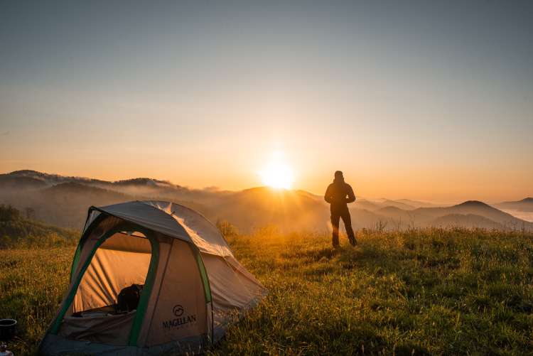 head out to the wilderness and go camping for a fun 40th birthday party idea