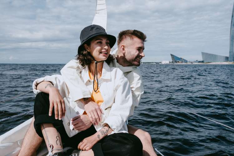 man and woman on a sightseeing boat tour