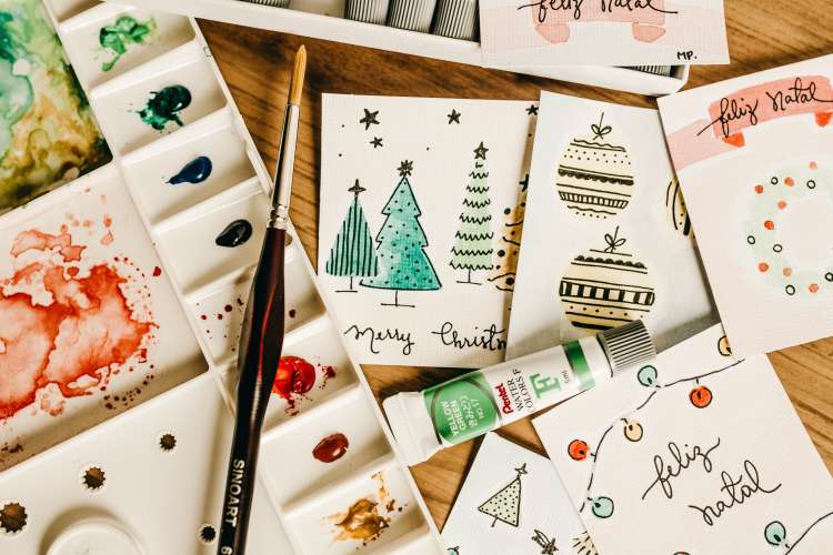 painting supplies and paper for making homemade holiday cards