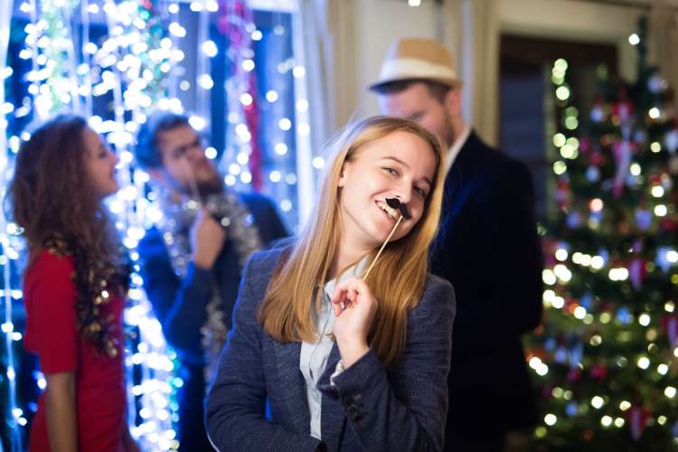 a photobooth is a fun new year's party idea