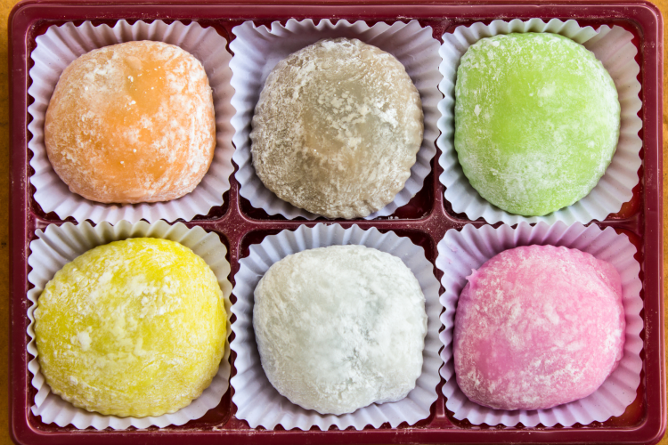 rainbow mochi ice creams on a plate