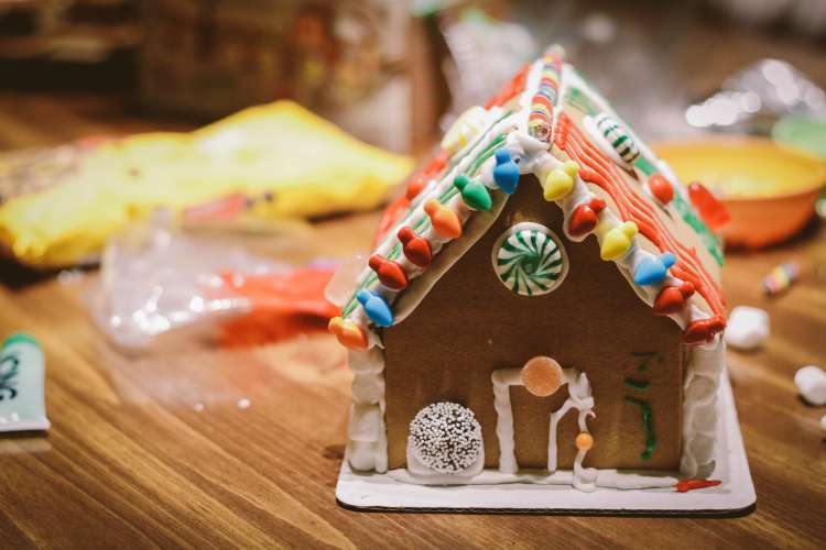 host a gingerbread house-making competition for a work christmas party idea