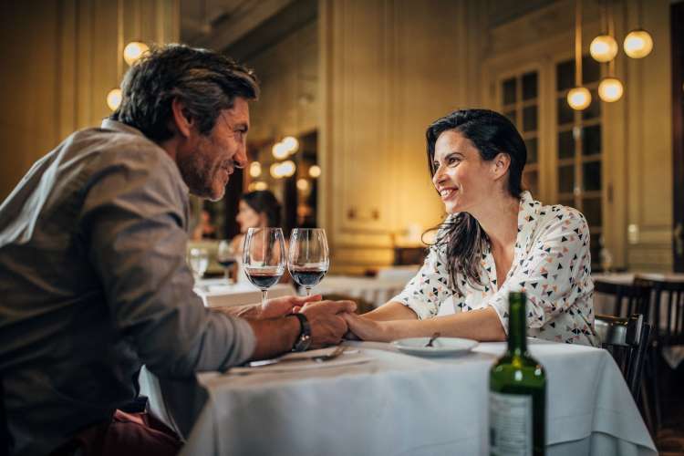 couple out to eat at an elegant restaurant