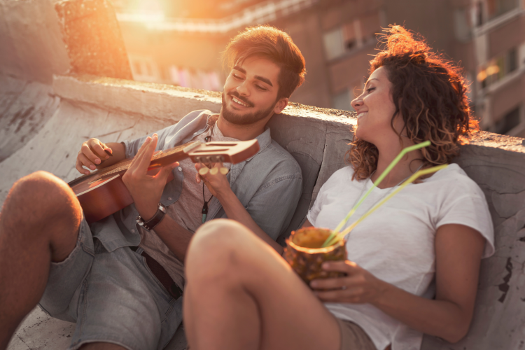 a rooftop picnic is a romantic anniversary idea at home