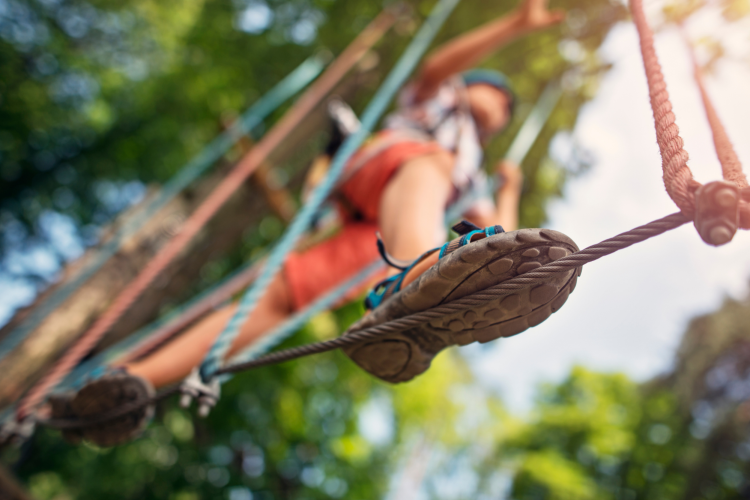 visiting a ropes course is a fun 21st birthday idea for him