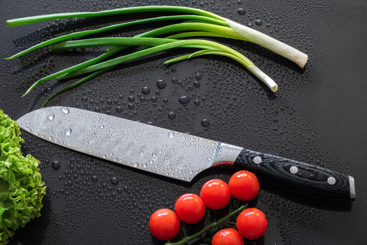 a santoku can be used to chop vegetables and herbs