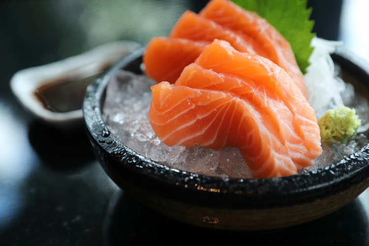 salmon sashimi over ice