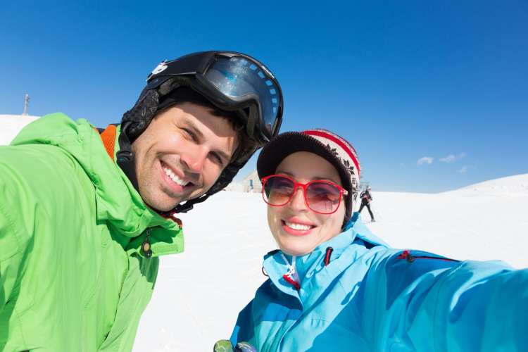 skiing is a fun thing for couples to do together