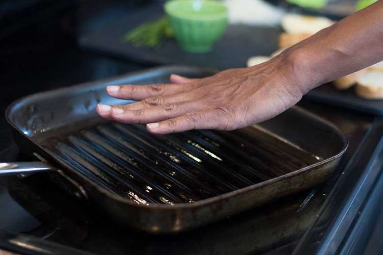 cooking steak in a pan