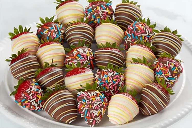 chocolate covered strawberries on a plate