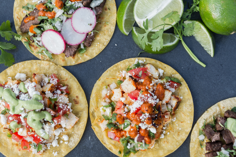 a taco bar is a fun engagement party theme idea