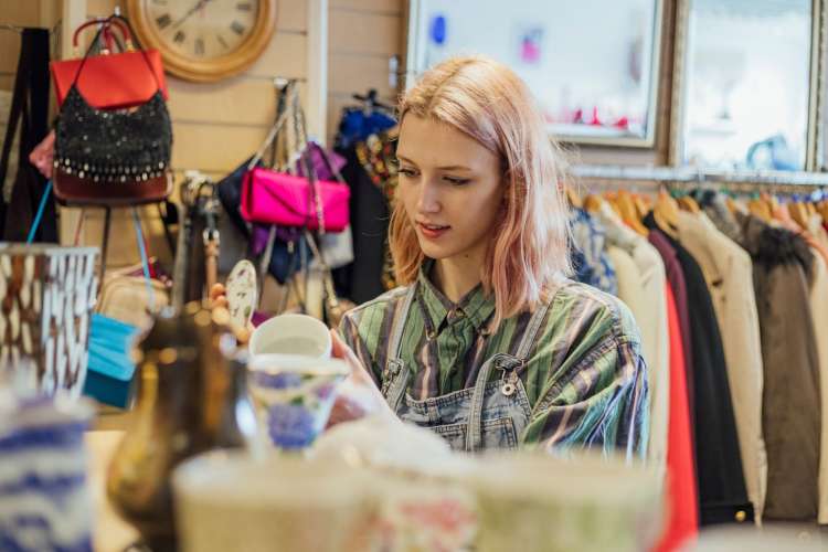 young woman at a thrift store