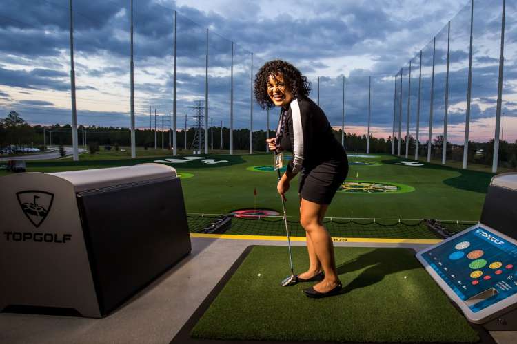 head to top golf for a fun galentine's day idea