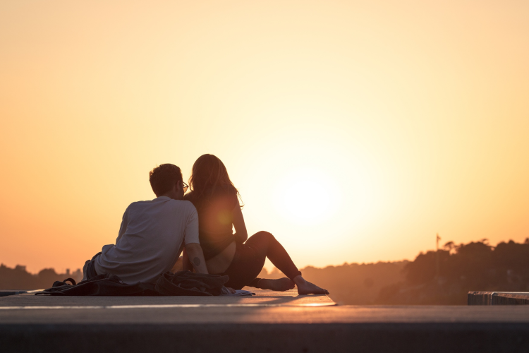 couple watching the sunset together