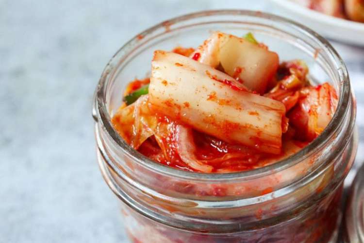 closeup of kimchi in a jar