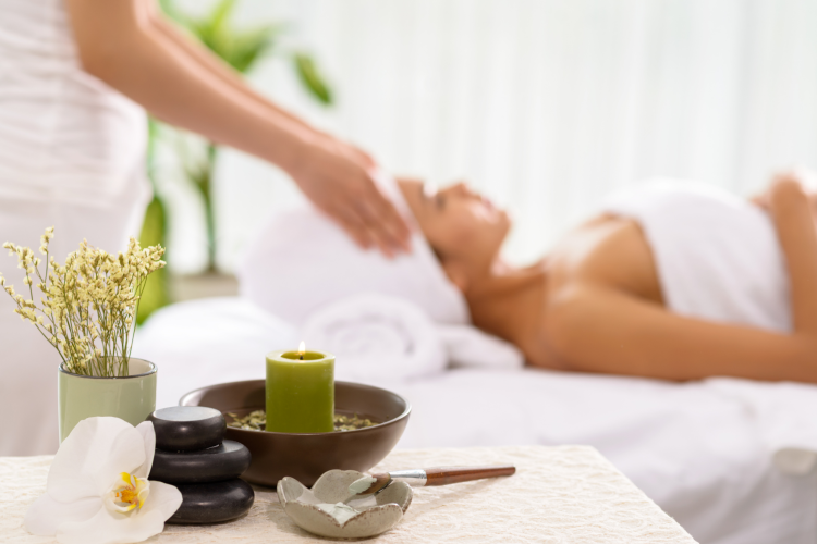 woman getting a massage at a spa