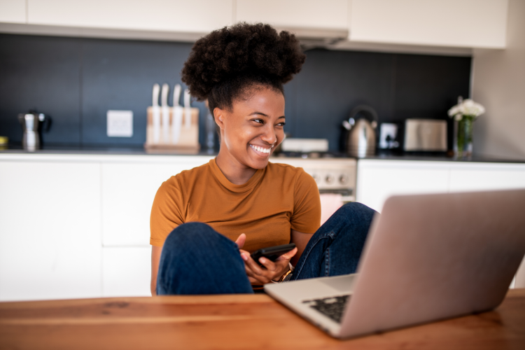 young woman video chatting with her coworkers