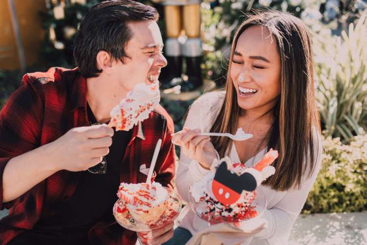 a couple eating yummy dessert together