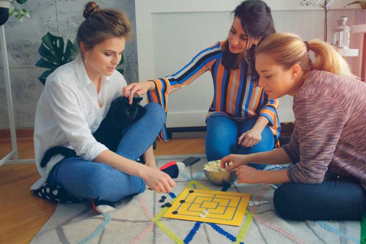 women playing board games