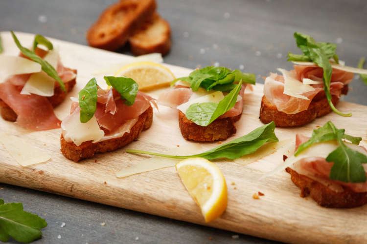 tapas bread with prosciutto and arugula