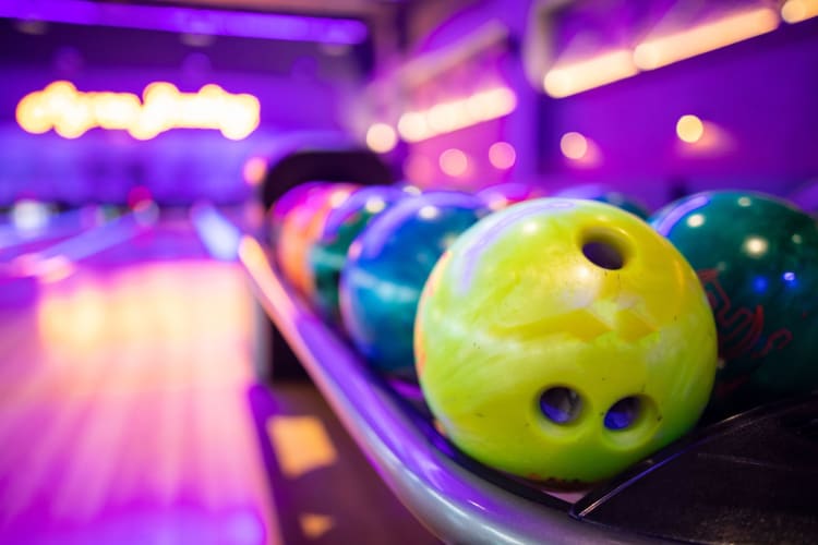 Balls in a bowling alley.