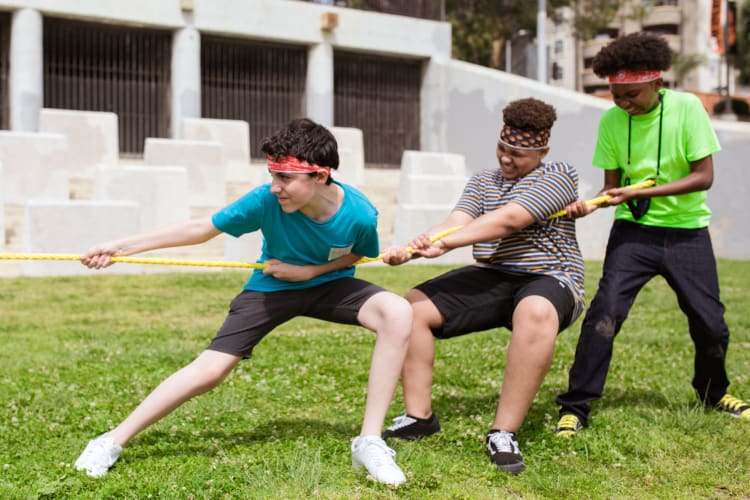 A tug of war is a great team building activity for sports teams