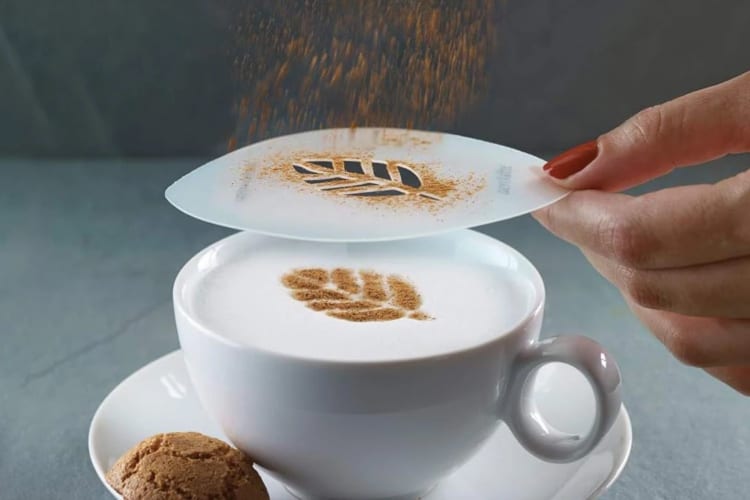 coffee art from a coffee stencil with cocoa powder