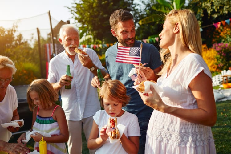 People outdoors at a 4th of July party