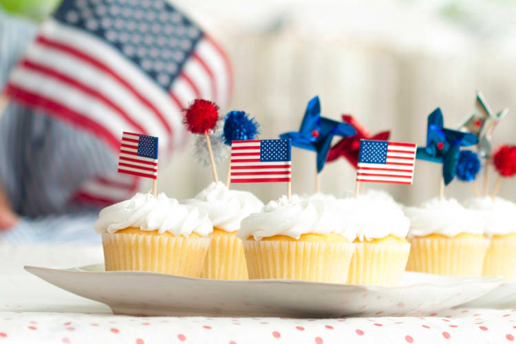 Decorating cupcakes is a cute 4th of July party idea