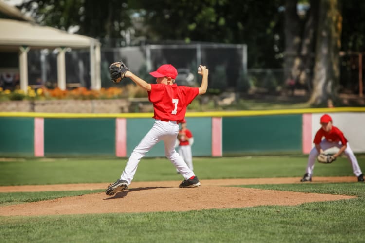 Playing baseball is a fun 4th of July party idea