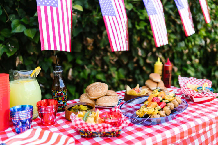 Picnic food on a 4th of July themed table