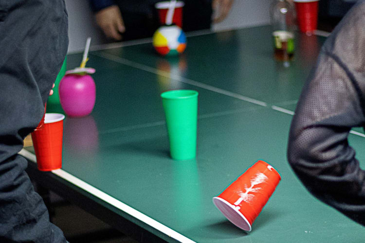 flip cup is a fun bachelor party game to spark competition